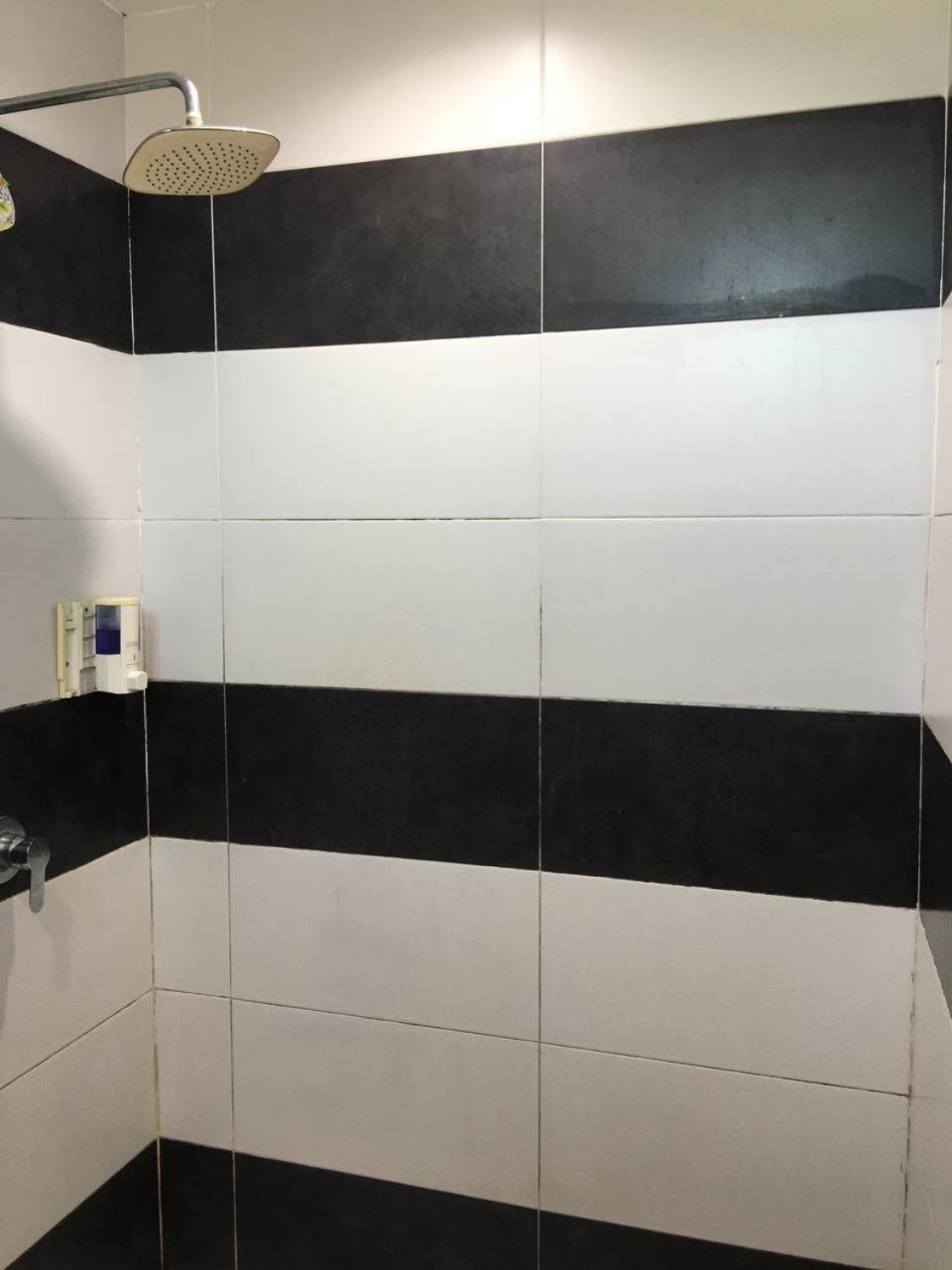 M Boutique Inn Miri Room photo